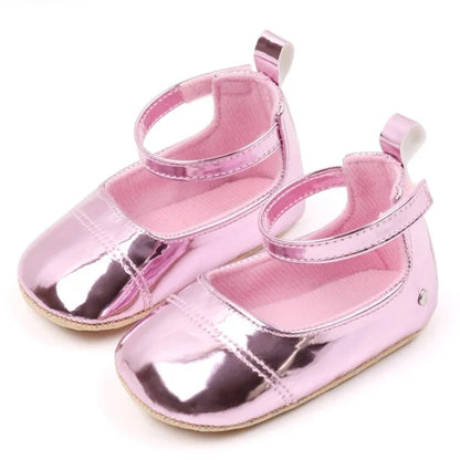 The perfect first time walker shoes for your little walker. Shower your little one's feet with style and comfort with our Bling Baby Shoes | Multiple Colors! Designed for newborns to 18 months, these shoes are perfect for your child's first steps. Supportive and durable, they'll keep your little walker's feet protected as they explore the world. Give them the confidence to take those first steps with our Bling Baby Shoes