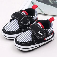 Load image into Gallery viewer, Your little one will be the most stylish walker on the block with these adorable sneakers! Built with a non-slip cotton sole, these shoes are perfect for those first steps and will keep your little rascal safe and secure. Give your child the best start with these fashionable and functional shoes.
