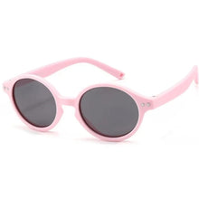 Load image into Gallery viewer, Experience the ultimate in sun protection for your little ones with our Ultra-light Baby and Toddler Sunglasses! These polarized, anti-UV shades are perfect for children ages 0-3 years. Keep your child&#39;s delicate eyes safe from harmful rays in retro round frames that are flexible and lightweight. Choose from multiple colors to fit your child&#39;s unique style. Trust us, these sunglasses are a must-have for any parent who values their child&#39;s well-being. Order now and see the difference they make!
