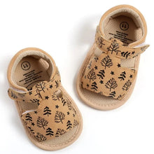 Load image into Gallery viewer, Made with soft materials and designed especially for newborns to 18 month olds, they are the perfect addition to any baby&#39;s wardrobe. Your little one will look and feel great while wearing these sandals, and you&#39;ll love the convenience of finding a quality pair of shoes that will grow with them. Don&#39;t miss out on giving your baby the best sandals for their growing feet!
