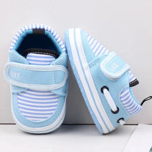 Load image into Gallery viewer, Your little one will be the most stylish walker on the block with these adorable sneakers! Built with a non-slip cotton sole, these shoes are perfect for those first steps and will keep your little rascal safe and secure. Give your child the best start with these fashionable and functional shoes.
