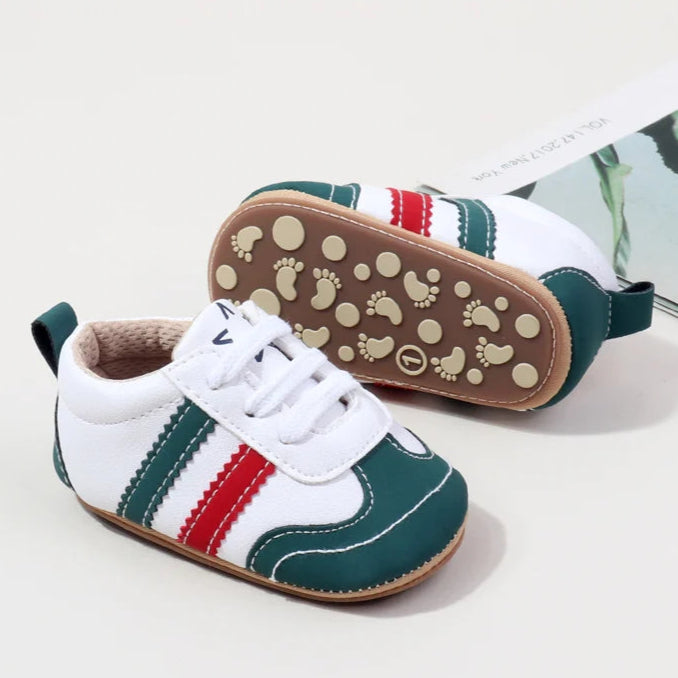 Designed with expert precision, these baby sneakers are crafted to fit children aged newborn through 18 months old with ultimate comfort and style.