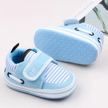 Load image into Gallery viewer, Your little one will be the most stylish walker on the block with these adorable sneakers! Built with a non-slip cotton sole, these shoes are perfect for those first steps and will keep your little rascal safe and secure. Give your child the best start with these fashionable and functional shoes.
