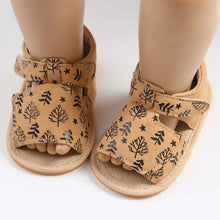 Load image into Gallery viewer, Made with soft materials and designed especially for newborns to 18 month olds, they are the perfect addition to any baby&#39;s wardrobe. Your little one will look and feel great while wearing these sandals, and you&#39;ll love the convenience of finding a quality pair of shoes that will grow with them. Don&#39;t miss out on giving your baby the best sandals for their growing feet!
