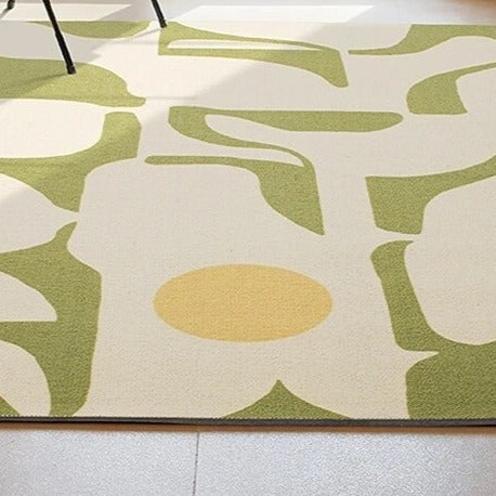 This modern minimalist green rug adds a touch of style to any room. Made of durable polyester, it’s easy to keep clean and comes in multiple sizes to fit any space. Perfect for kids' bedrooms!
