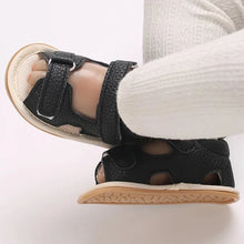 Load image into Gallery viewer, Indulge your little one in the ultimate comfort with our Valentina Baby Sandals, available in a variety of vibrant colors including green, black, white, and brown. Perfect for newborns up to 18 months, these stylish sandals are sure to make a statement and keep your baby&#39;s feet looking and feeling great..
