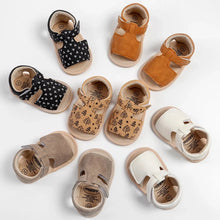 Load image into Gallery viewer, Made with soft materials and designed especially for newborns to 18 month olds, they are the perfect addition to any baby&#39;s wardrobe. Your little one will look and feel great while wearing these sandals, and you&#39;ll love the convenience of finding a quality pair of shoes that will grow with them. Don&#39;t miss out on giving your baby the best sandals for their growing feet!
