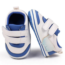 Load image into Gallery viewer, Non-slip casual shoes with soft soles. Introduce your little one to the joys of walking with our Sporty Baby Sneakers! Made for newborns to 18 months, these sneakers are perfect for first-time walkers. With non-slip soles and a comfortable fit, they provide both safety and style. Let your baby take their first steps in confidence with our Sporty Baby Sneakers
