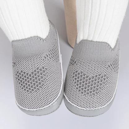 Easily breathable and featherlight infant shoes in shades of pink, white, and grey; perfect for newborns up to 18 months of age.