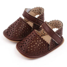 Load image into Gallery viewer, There&#39;s nothing cuter than watching your little one take their first steps in our Barcelona Baby Sandals! Available in magenta, white, brown, and black, these non-slip casual shoes feature soft soles for maximum comfort and support. Perfect for little explorers on the go, you can trust that our sandals will keep your baby&#39;s precious feet safe and comfy all day long. Give them the gift of style and functionality with our versatile Barcelona Baby Sandals!&nbsp;
