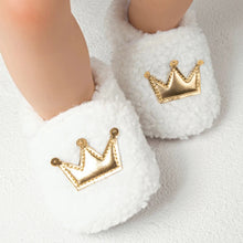 Load image into Gallery viewer, These cozy, snuggly slippers are fit for a royal baby! Made with fluffy teddy bear fabric to keep little toes warm and toasty. Available in sizes for newborns up to 18 months old. Choose from white, grey, or brown.
