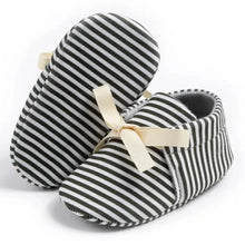 Load image into Gallery viewer, Introducing our adorable striped baby Mary Janes, available in a variety of colors and sizes, perfect for newborns up to 18 months. Experience the unmatched comfort and softness of these must-have shoes!
