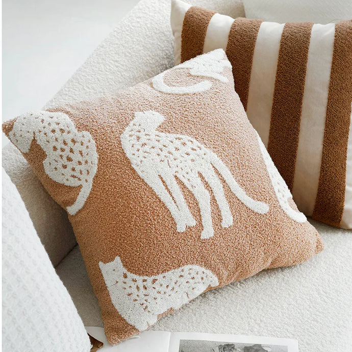 Indulge in the ultimate addition to your child's bedroom or playroom with this exquisite embroidered taupe leopard pillow case.