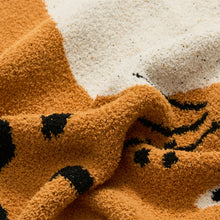 Load image into Gallery viewer, Keep your little one cozy and snug in this luxurious jacquard knitted blanket. Made from microfiber, this medium sized blanket is perfect for a nursery, kids bedroom, or playroom and features sophisticated beige and khaki colors. Snuggle in warmth and comfort with 51.18 x 62.99 inches (130cm x 160cm) of Cozy Jacquard Knitted Blanket! 
