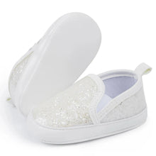 Load image into Gallery viewer, Not only will your little angel look fashionable in these stylish gold, silver and white baby loafers, but they will also stay safe and comfortable with their anti-slip, soft-sole design. Perfect for newborns up to 18 months, these shoes are easy to put on and take off, making your life as a busy parent a little easier. Provide your child with both fashion and function with our sparkling loafers in multiple colors and sizes.
