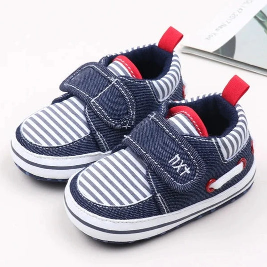 Your little one will be the most stylish walker on the block with these adorable sneakers! Built with a non-slip cotton sole, these shoes are perfect for those first steps and will keep your little rascal safe and secure. Give your child the best start with these fashionable and functional shoes.