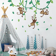 Load image into Gallery viewer, Bring a wild jungle into your kids&#39; bedroom with our fun and unique Jungle Monkeys Wall Decal! Made of durable PVC material, this peel and stick decal is easy to use and – don’t worry – completely removable when you’re ready for a decor switch-up. Get your family of monkeys movin&#39; and groovin&#39; on the wall in no time!
