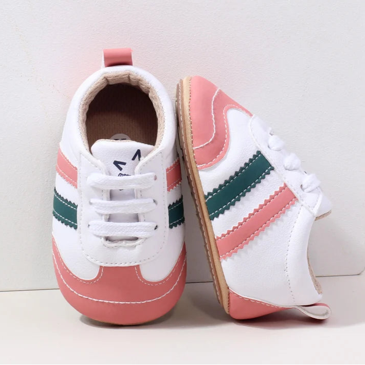 Designed with expert precision, these baby sneakers are crafted to fit children aged newborn through 18 months old with ultimate comfort and style.