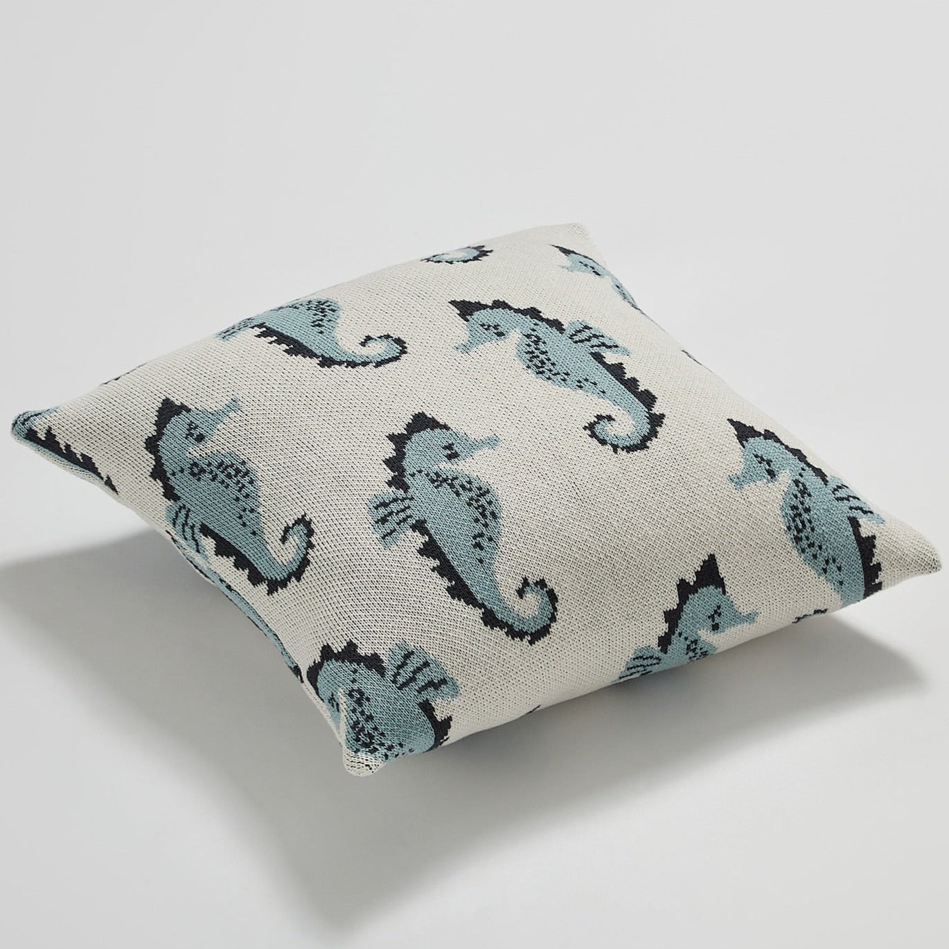 Introducing the knitted sea horse throw pillow in blue or pink! Add a cozy, soft and unique touch to your kid's bedroom or nursery with this adorable pillow cover. Its size of 17.71 x 17.71 inches (45cm x 45cm) makes it the perfect addition to any room. Made from 100% cotton, this pillow will be your kid's favorite and the perfect accent for any nursery.