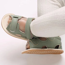 Load image into Gallery viewer, Indulge your little one in the ultimate comfort with our Valentina Baby Sandals, available in a variety of vibrant colors including green, black, white, and brown. Perfect for newborns up to 18 months, these stylish sandals are sure to make a statement and keep your baby&#39;s feet looking and feeling great..
