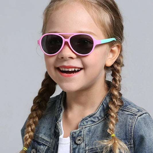 Elevate your child's look with our Polarized Kid's Pilot Sunglasses, offering both style and functionality! These sunglasses are polarized, anti-reflective, and flexible, making them the perfect accessory for your little one!