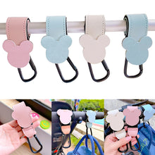 Load image into Gallery viewer, This high-quality Mickey Mouse Baby Bag Stroller Hook is made of PU leather and is available in mint, pink, black, red, and beige.
