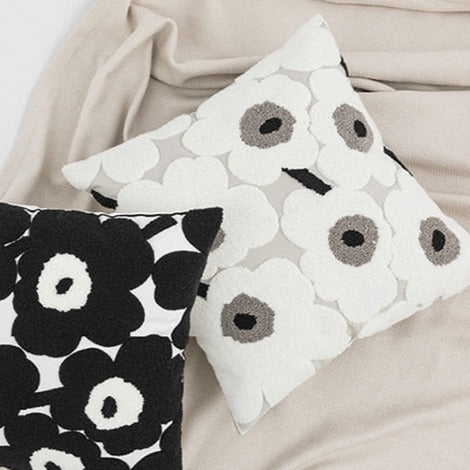 Transform their bedroom into a sophisticated and cozy setting with this stunning floral white and grey pillow cover! Embroidered with beautiful flowers and crafted to be super soft, this cover adds a touch of chicness to your little one's space - snuggle up for a blissful night's sleep!