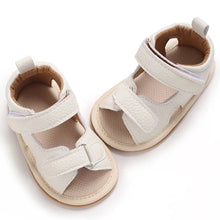 Load image into Gallery viewer, Indulge your little one in the ultimate comfort with our Valentina Baby Sandals, available in a variety of vibrant colors including green, black, white, and brown. Perfect for newborns up to 18 months, these stylish sandals are sure to make a statement and keep your baby&#39;s feet looking and feeling great..
