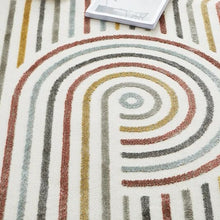 Load image into Gallery viewer, Transform your child&#39;s bedroom into a stunning work of art with the minimalist geo swirl rug, an elegant and exclusive piece that elevates any bedroom. Crafted from premium materials and available in multiple sizes, this vivid rug is sure to captivate with its timeless swirl design. An exquisite addition to any home.
