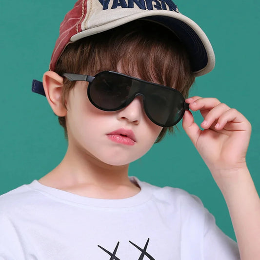 Introducing the ultimate sunglasses fit for your little royalty - the King sunglasses! With polarized lenses and anti-reflective coating, your child's eyes will be protected from harsh glares while they enjoy flexible and comfortable wear.