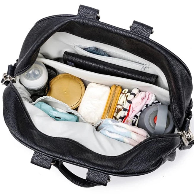 The Black Diaper Bag is a stylish and practical addition to any parent's arsenal of equipment. Constructed with durable fabrics, the bag can handle plenty of wear and tear and is a convenient way to store diapers and other necessities.