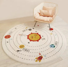 Load image into Gallery viewer, Bring a cheerful touch to your little one&#39;s playroom with this soft and durable polyester space rug! Its vibrant modern look will light up the room - and both you and your kids will love the cozy comfort of its polyester fibers beneath your feet!
