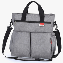Load image into Gallery viewer, The grey diaper bag is a versatile, multi-functional choice for moms, designed to be waterproof and perfect for changing. Additionally, it boasts a colorful grey design that is both stylish and practical.
