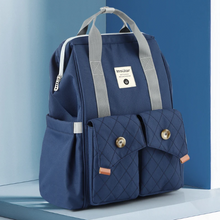 Load image into Gallery viewer, The Dark Blue Diaper Backpack is a fashionable and practical solution for parents on-the-go. This versatile bag comes with stroller straps and a changing pad for added convenience, making it an essential item for modern parents. Size: 10.62 x 16.14 x 6.69 inches (W x H  x D) 27cm x 41cm x 17cm Material: Polyester Closure Type: Zipper Item Weight: 0.55kg
