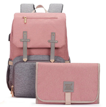 Load image into Gallery viewer, This waterproof pink and grey diaper backpack is designed to be the ultimate solution for busy parents.  Size: 17.32 x 11.81 x 7.08 inches ( H x W x D) 44cm x 30cm x 18cm Material: Polyester Closure Type: Zipper and Hasp
