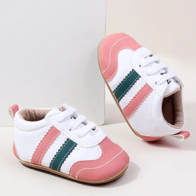 Designed with expert precision, these baby sneakers are crafted to fit children aged newborn through 18 months old with ultimate comfort and style.