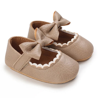 Indulge your little one's feet with our adorable Mary Jane baby shoes in a selection of sweet colors. Perfect for newborns through 18 months old, choose from white, black, apricot, and brown to match any outfit.