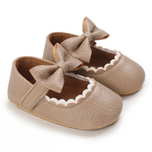 Load image into Gallery viewer, Indulge your little one&#39;s feet with our adorable Mary Jane baby shoes in a selection of sweet colors. Perfect for newborns through 18 months old, choose from white, black, apricot, and brown to match any outfit.
