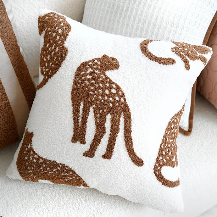 Experience the ultimate combination of sophistication and fun with our Geometric Embroidered Leopard Pillow Case for your child's bedroom or playroom! Transform your kid's room into a stylish and playful haven with our Embroidered Leopard Pillow Case. Let their imagination run wild with this sophisticated and fun addition to their space.