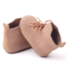 Load image into Gallery viewer, These breathable baby booties keep little feet cozy and comfortable, while allowing for natural movement. Perfect for kids newborn to 18 months, available in three colors – beige, black, and pink – these booties are a must-have for any parent! Get yours today and keep your baby&#39;s feet safe! Material: Cotton . Outsole Material: Rubber. Closure Type: Elastic Band.
