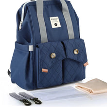 Load image into Gallery viewer, The Dark Blue Diaper Backpack is a fashionable and practical solution for parents on-the-go. This versatile bag comes with stroller straps and a changing pad for added convenience, making it an essential item for modern parents. Size: 10.62 x 16.14 x 6.69 inches (W x H  x D) 27cm x 41cm x 17cm Material: Polyester Closure Type: Zipper Item Weight: 0.55kg
