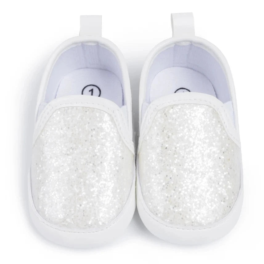 Not only will your little angel look fashionable in these stylish gold, silver and white baby loafers, but they will also stay safe and comfortable with their anti-slip, soft-sole design. Perfect for newborns up to 18 months, these shoes are easy to put on and take off, making your life as a busy parent a little easier. Provide your child with both fashion and function with our sparkling loafers in multiple colors and sizes.