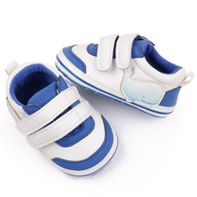 Load image into Gallery viewer, Non-slip casual shoes with soft soles. Introduce your little one to the joys of walking with our Sporty Baby Sneakers! Made for newborns to 18 months, these sneakers are perfect for first-time walkers. With non-slip soles and a comfortable fit, they provide both safety and style. Let your baby take their first steps in confidence with our Sporty Baby Sneakers
