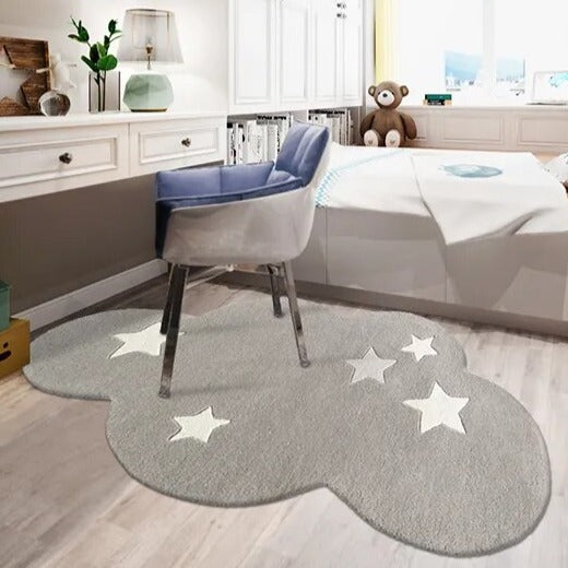 This white cloud and stars rug offers an enchanting addition to your child's bedroom. Crafted from premium polyester for long-lasting appeal, its whimsical cloud and star motif is sure to bring a sense of serene beauty to the space. If there's a slight odor, Don't worry it is non-toxic and harmless just part of the rug creation. Place it in a ventilated area until it's odorless. Add an element of luxurious comfort to your child's space with this stunning rug.