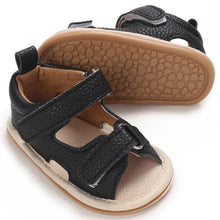 Load image into Gallery viewer, Indulge your little one in the ultimate comfort with our Valentina Baby Sandals, available in a variety of vibrant colors including green, black, white, and brown. Perfect for newborns up to 18 months, these stylish sandals are sure to make a statement and keep your baby&#39;s feet looking and feeling great..
