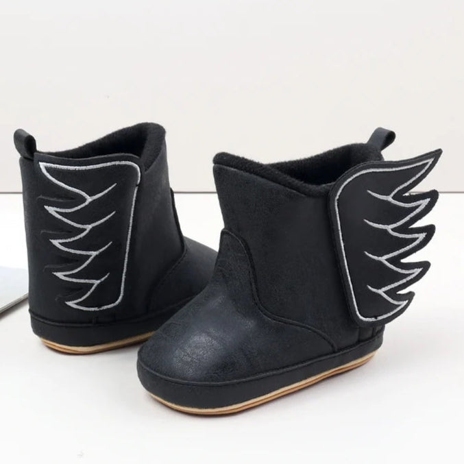 Designed with both style and comfort in mind, these baby wing boots are perfect for your little one from the moment they are born up to 18 months old. With multiple sizes and colors available, you'll have a pair for every occasion. Not only will they keep your baby's feet warm and cozy, but they'll also add a touch of fashion to their outfit. Expertly crafted with high-quality materials, these boots are durable and long-lasting, making them a practical choice for any parent.