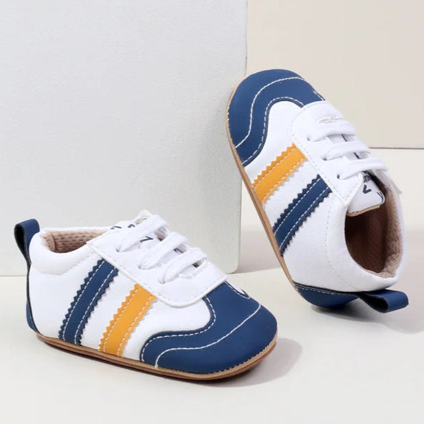 Designed with expert precision, these baby sneakers are crafted to fit children aged newborn through 18 months old with ultimate comfort and style.