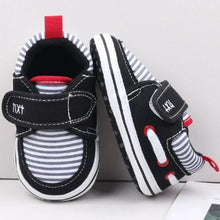 Load image into Gallery viewer, Your little one will be the most stylish walker on the block with these adorable sneakers! Built with a non-slip cotton sole, these shoes are perfect for those first steps and will keep your little rascal safe and secure. Give your child the best start with these fashionable and functional shoes.
