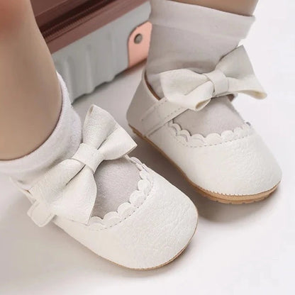 Indulge your little one's feet with our adorable Mary Jane baby shoes in a selection of sweet colors. Perfect for newborns through 18 months old, choose from white, black, apricot, and brown to match any outfit.