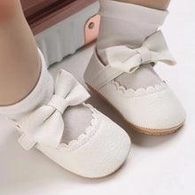 Load image into Gallery viewer, Indulge your little one&#39;s feet with our adorable Mary Jane baby shoes in a selection of sweet colors. Perfect for newborns through 18 months old, choose from white, black, apricot, and brown to match any outfit.
